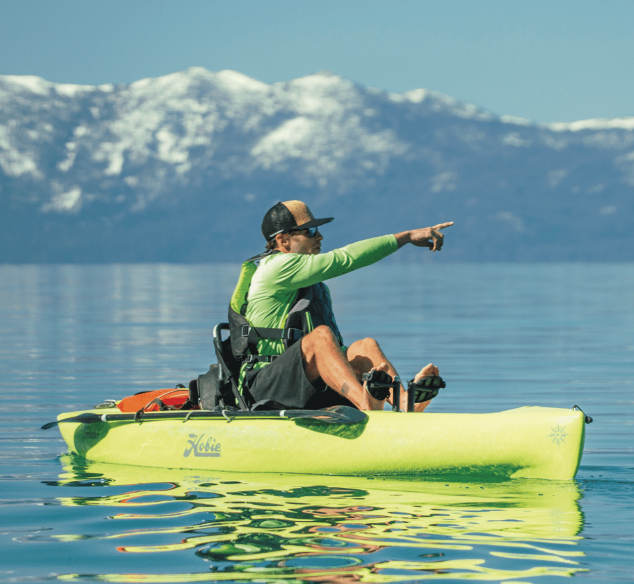 Screenshot 2024-06-09 at 6.52.08 PM a man riding a green boat on a body of water